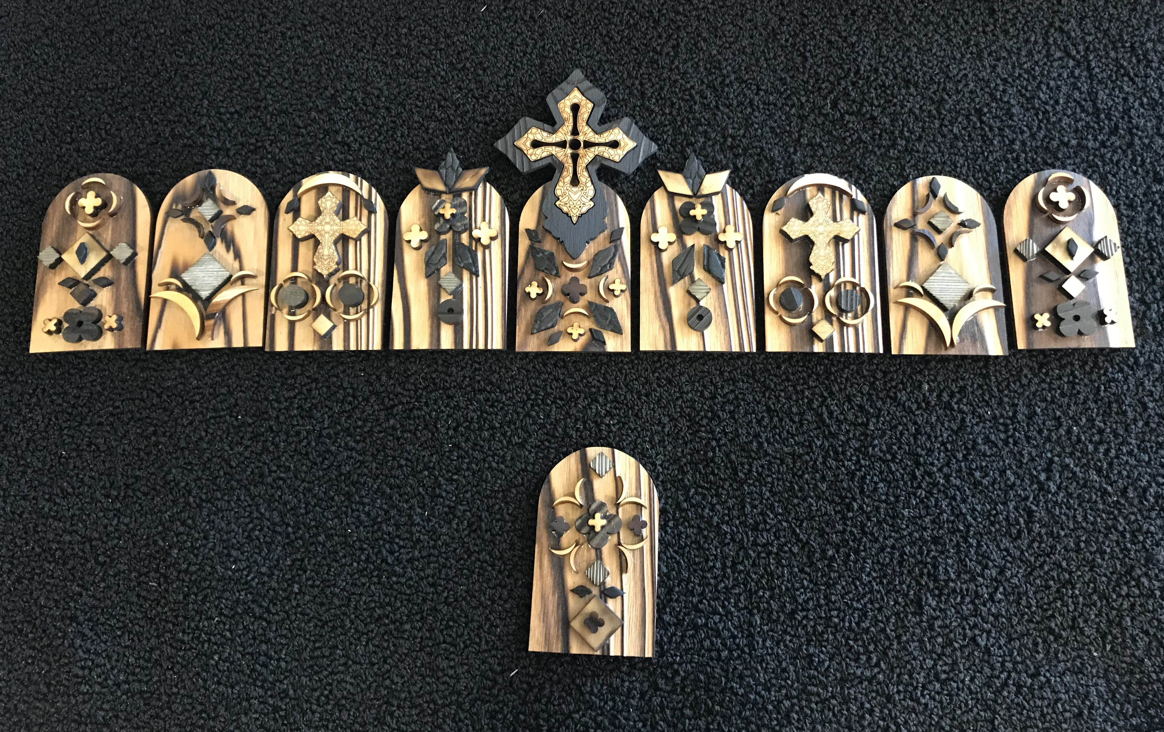 Pieces of an intricate crown made from built up wood