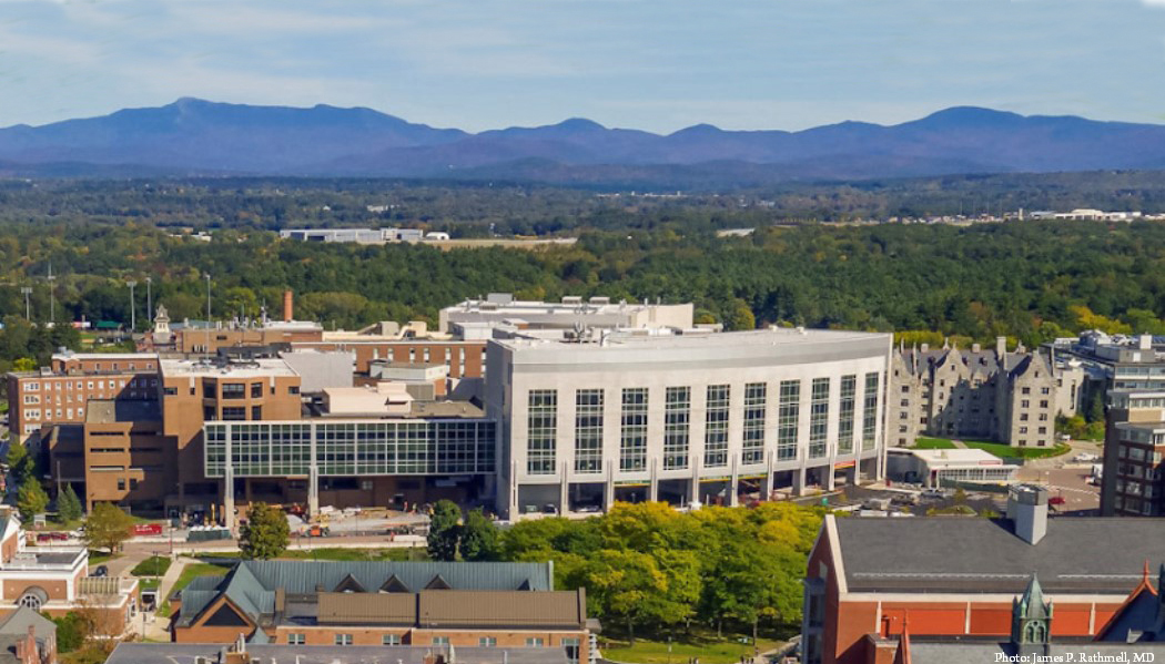 University of Vermont Medical Center patient tower surrounded by plants and trees