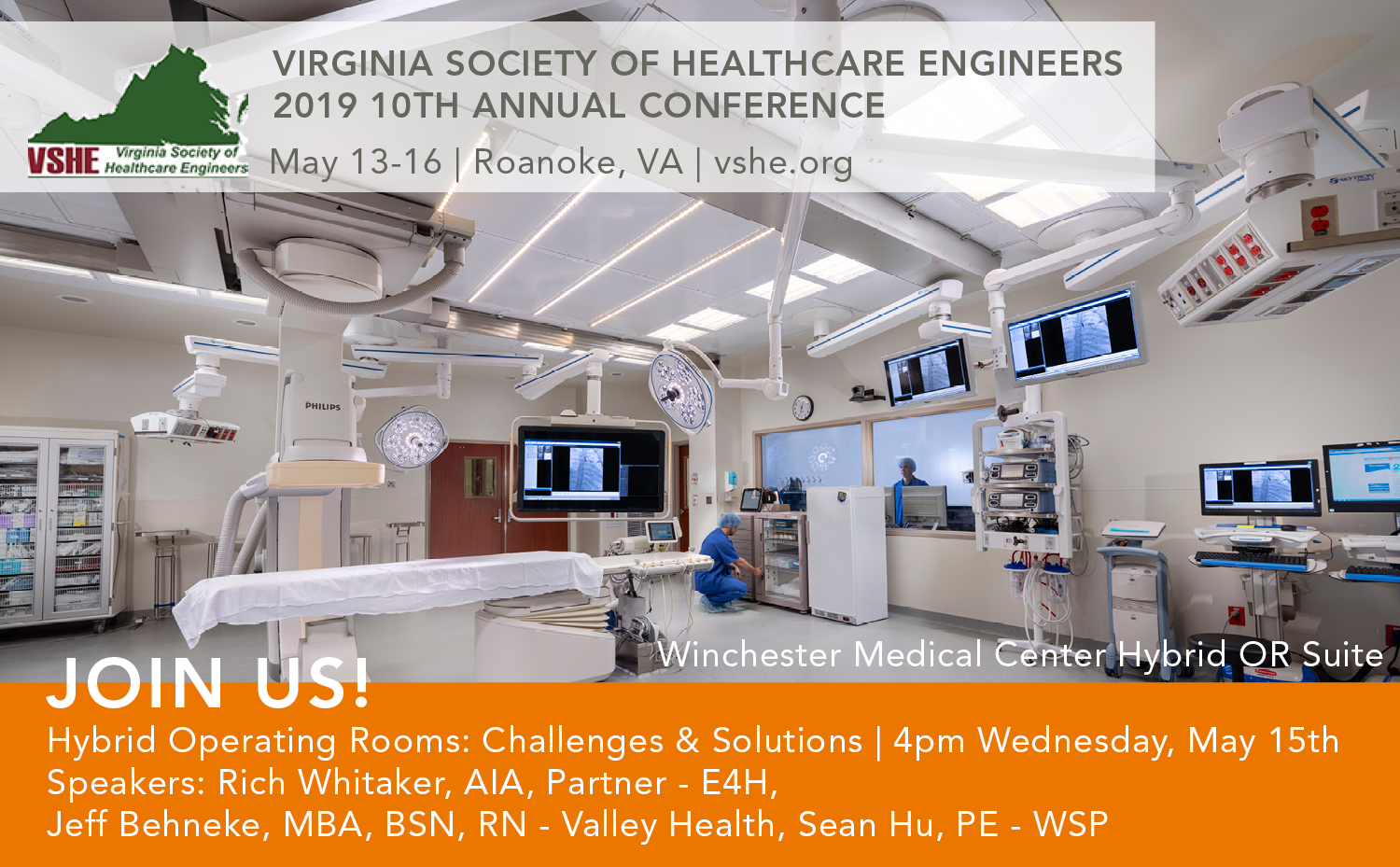 Operating room with staff, table, monitors, lights, and equipment