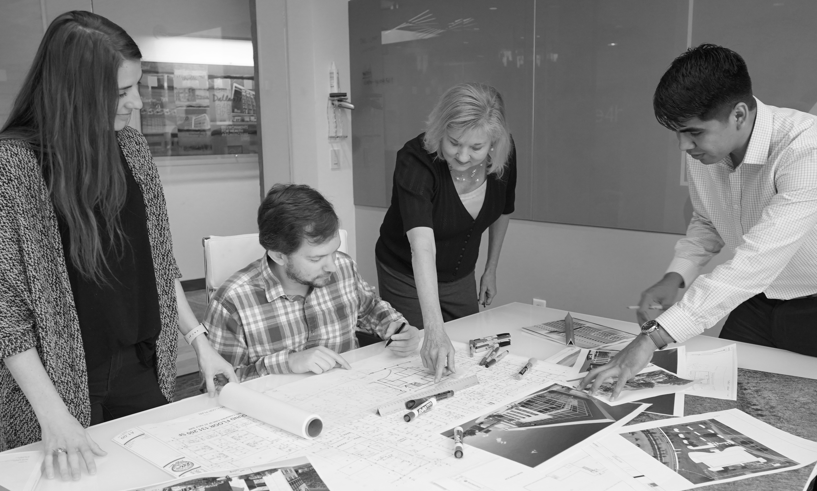 Kelly Byrd in discussion with team